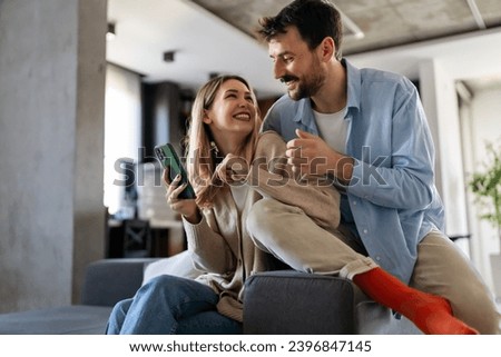 Similar – Image, Stock Photo Loving couple looking at each other