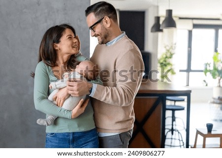 Similar – Image, Stock Photo Little new born girl lying down and trying to relax