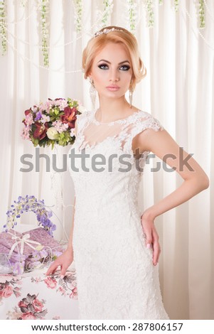 Beautiful and fashion bride in luxury interior. Beautiful and fashion bride with glamour makeup and hairstyle