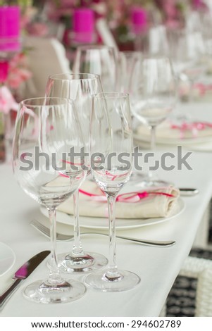 Wedding Table Decoration. Table set for a wedding dinner in pink