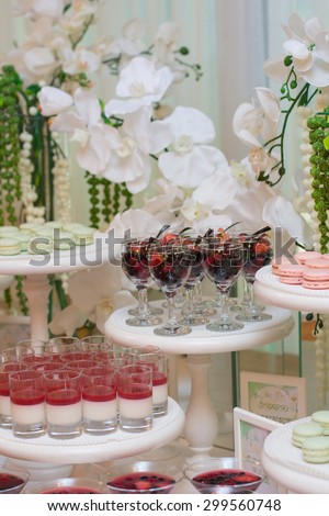 Wedding Table Decoration. Table set for a wedding dinner in pink and green