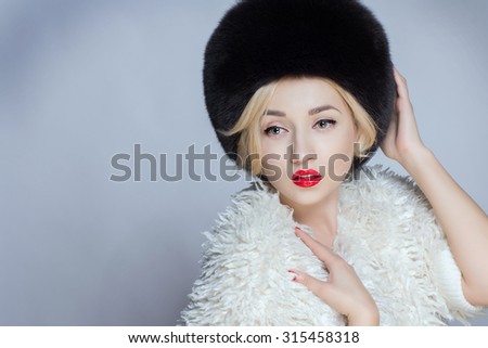 Winter Woman Portrait. Beauty Model Girl. Fur Fashion. Beautiful Girl in Fur Hat