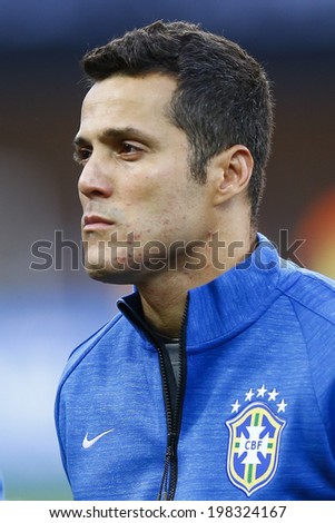 SAO PAULO, BRAZIL - June 12, 2014: Julio Cesar during Brazil\'s National Anthem at the World Cup Group A opening game between Brazil and Croatia at Corinthians Arena. No Use in Brazil.