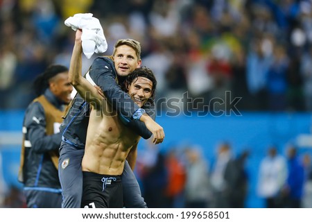 SAO PAULO, BRAZIL - June 19, 2014:Uruguay players celebrate the victory of the 2014 World Cup Group D game between Uruguay and England at Arena Corinthians. No Use in Brazil.
