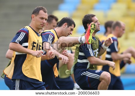 RIO DE JANEIRO, BRAZIL - JUNE 21, 2014: Players of Russia are seen during a training session at the Maracana Stadium. NO USE IN BRAZIL.