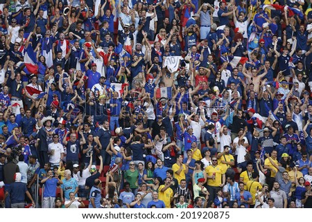 BRASILIA, BRAZIL - June 30, 2014: Supporters of France team on the World Cup 2014 Round of 16 game between France and Nigeria at Estadio Nacional Mane Garrincha in Brazil. No Use in Brazil.
