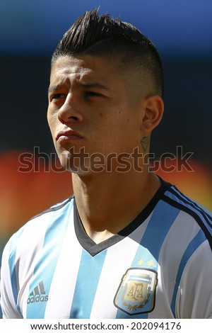 SAO PAULO, BRAZIL - July 1, 2014: Marcos Rojo during Argentina National Anthem at the 2014 World Cup Round of 16 game between Argentina and Switzerland at Arena Corinthians. No Use in Brazil.