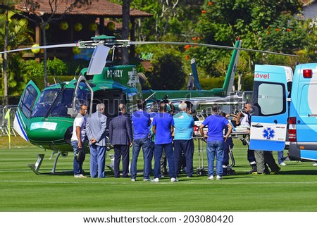TERESOPOLIS, BRAZIL - JULY 05, 2014: Neymar leaves the Brazil National Team's center for treatment of his injuries suffered during the Brazil vs Colombia World Cup Quarter-finals game. NO USE IN BRAZIL.