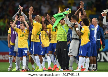 BELO HORIZONTE, BRAZIL - July 8, 2014: Brazil players at the end of the World Cup Semi-finals game against Germany at Mineirao Stadium. NO USE IN BRAZIL.