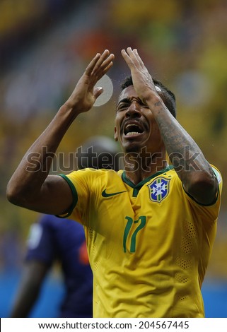BRASILIA, BRAZIL - JULY 12, 2014: Luiz Gustavo of Brazil during the World Cup Third place game between Brazil and the Netherlands in the Estadio Nacional. NO USE IN BRAZIL.