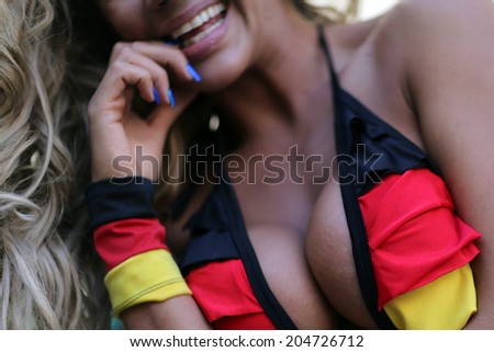 RIO DE JANEIRO, BRAZIL - July 13, 2014: German fan celebrating at the 2014 World Cup Final game between Argentina and Germany at Maracana Stadium. NO USE IN BRAZIL.