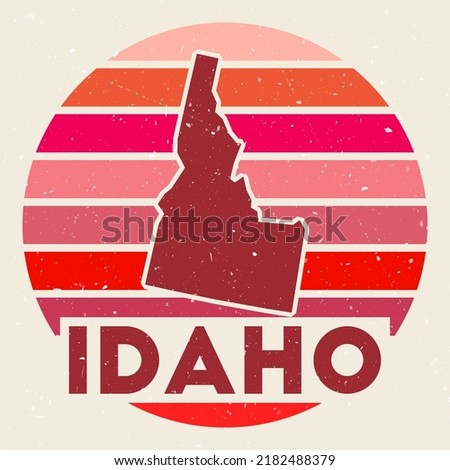 Idaho logo. Sign with the map of us state and colored stripes, vector illustration. Can be used as insignia, logotype, label, sticker or badge of the Idaho.