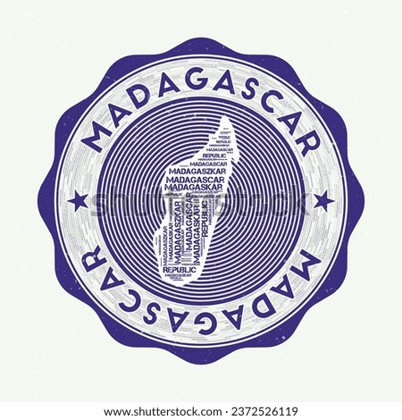 Madagascar seal. Country round logo with shape of Madagascar and country name in multiple languages wordcloud. Astonishing emblem. Charming vector illustration.