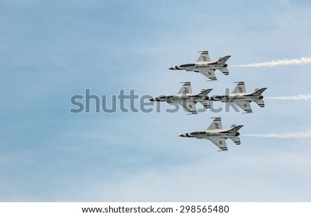 Niagara Falls, NY - July 18, 2015: USAF Thunderbirds perform at the Thunder of Niagara Air Show at Niagara Falls AFB.  Squadron is the official air demonstration team for the United States Air Force.