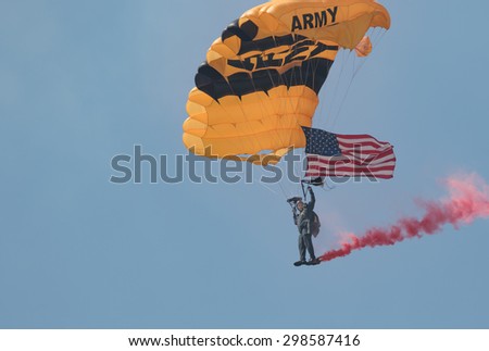 NIAGARA FALLS, NY, JULY 18, 2015: A member of the US Army Golden Knights Parachute Team performs at the Thunder of Niagara Air Show on July 18, 2015 at the Niagara Falls AFB in Niagara Falls, New York