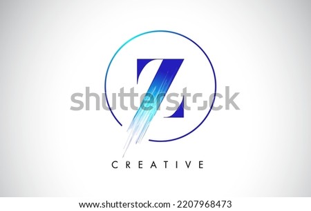 Z Brush Stroke Letter Logo Design. Blue Paint Logo Leters Icon with Elegant Circle Vector Design.
