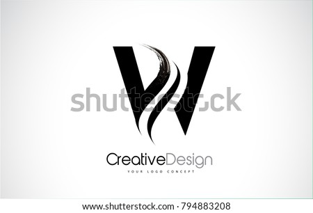 W Letter Design Brush Paint Stroke. Letter Logo with Black Paintbrush Stroke. Zdjęcia stock © 