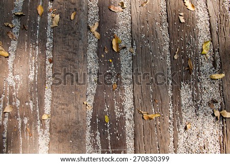 Leaves fallen on wooden ground ground