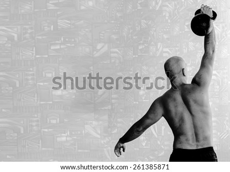 Back view of man doing workout with kettlebell background. Black-and-white, horizontal