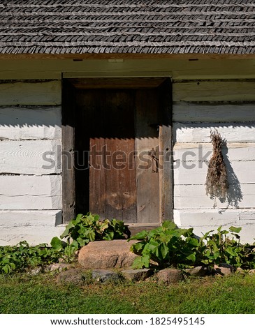 a wooden Podlasie house and a granary from the turn of the 19th and 20th centuries, currently located in Jurowce in Podlasie, Poland Zdjęcia stock © 