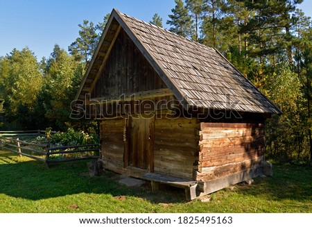 a wooden Podlasie house and a granary from the turn of the 19th and 20th centuries, currently located in Jurowce in Podlasie, Poland Zdjęcia stock © 