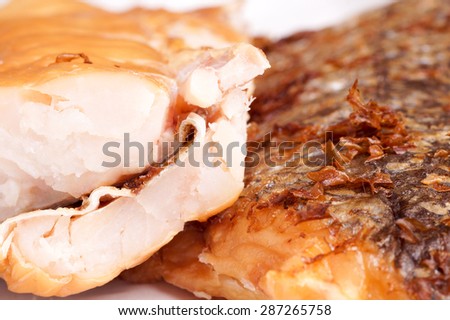 Smoked Fish Hake Fillet. Close up of delicious smoked wild Hakes, ready for serving