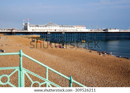 BRIGHTON - AUGUST 2015: Brighton Pier in Brighton UK, on August 2015. People travel to the seaside town of Brighton to enjoy the beach, sea and the pier