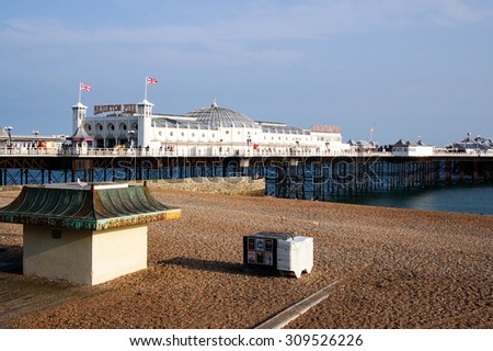 BRIGHTON - AUGUST 2015: Brighton Pier in Brighton UK, on August 2015. People travel to the seaside town of Brighton to enjoy the beach, sea and the pier