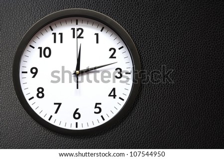 clock or watch on a wall with copyspace showing time concept