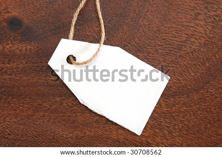 blank price tag with copyspace on wood