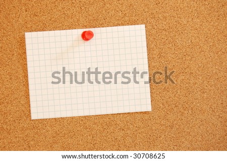 blank sheet paper with copyspace and pin on bulletin board