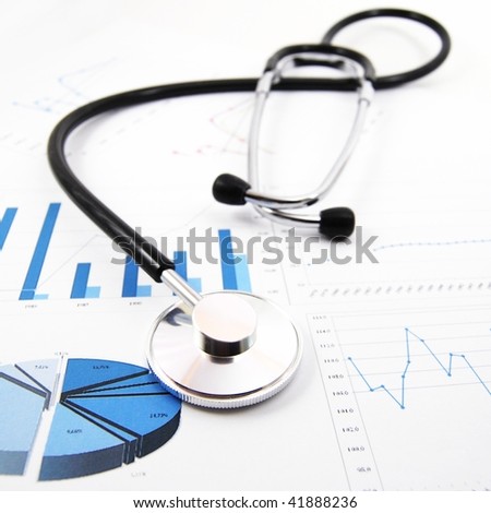 stethoscope on medical data chart in hospital