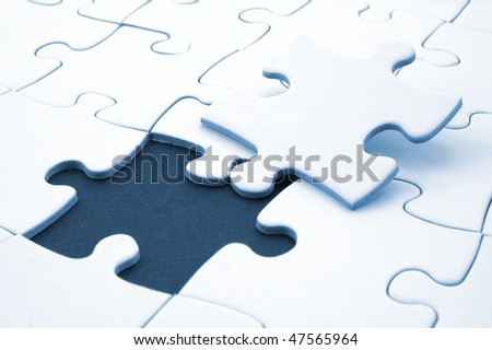 abstract background with a blank white puzzle