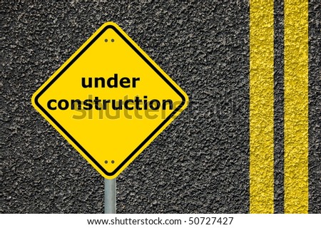 this website is under construction shown by yellow road sign
