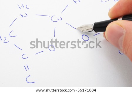 chemical formula with hand and pan ob sheet of paper