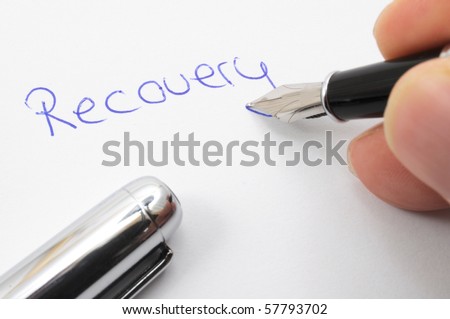 recovery concept with word written on paper and pen