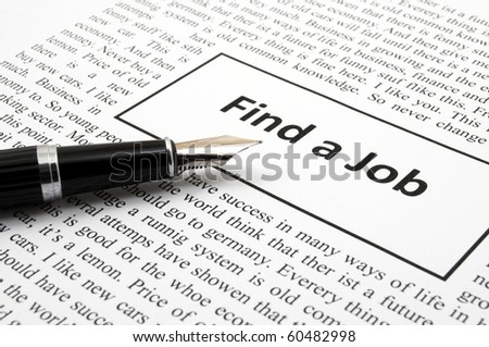 find a job in newspaper showing unemployment concept