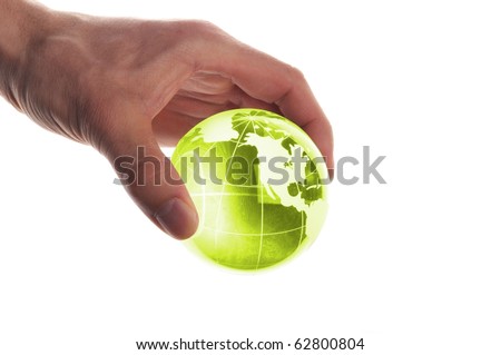 hand holding globe to protect the fragile environment