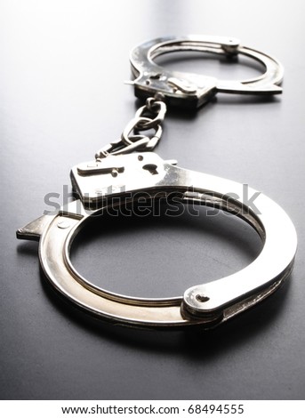 Police Handcuffs On Black Background Showing Law Concept Stock Photo ...