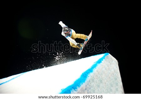DENVER, CO - JAN 26: Unidentified Participant in the LG FIS World Cup Snowboard Big Air competition which drew an international roster of the top male snowboarders from around the globe January 26, 2011 in Denver, CO.
