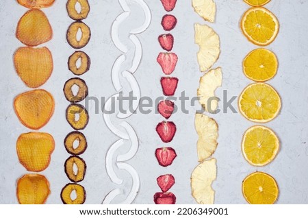 assortied dried chips on grey background. Fruit chips. Healthy eating concept, snack, no sugar. Top view, copy space.  Photo stock © 
