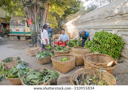 MANDALAY, MYANMAR - JAN 13 : Unidentified people selling bananas at local market January 13, 2015 in Mandalay, Myanmar.