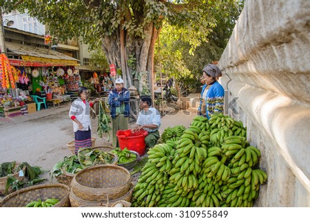 MANDALAY, MYANMAR - JAN 13 : Unidentified people selling bananas at local market January 13, 2015 in Mandalay, Myanmar.