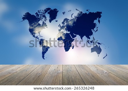 Wood terrace and blurred Blue sky background with world map