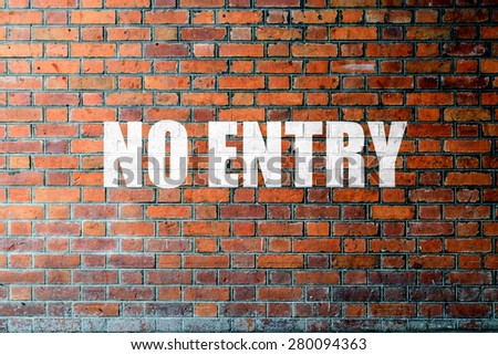 Red Brick wall texture background with a word No Entry