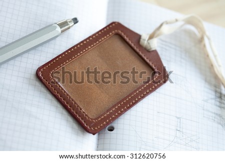 leather luggage tag and notebook pencil for plan journey