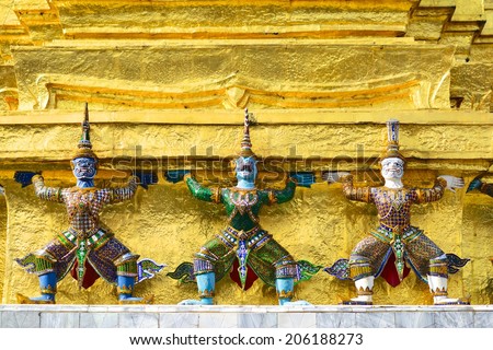 Giant statue at the Golden Pagoda in Temple of the Emerald Buddha, the Grand Palace, Bangkok, Thailand