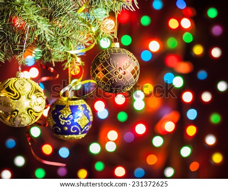 christmas ball on Christmas tree on abstract light background.