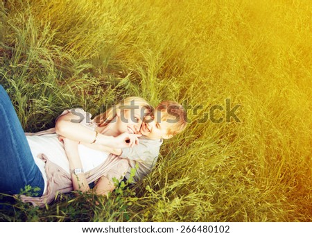Happy family concept. Mother and her child son enjoying summer and playing. Sunny summer weather. Close up. Outdoor shot. Copy-space.