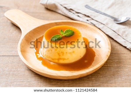 Similar – Image, Stock Photo Brown eggs and baking ingredients on a kitchen table. Rustic style.